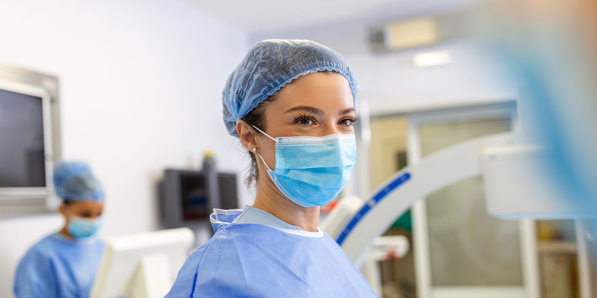 A surgery attendant prepares for a procedure